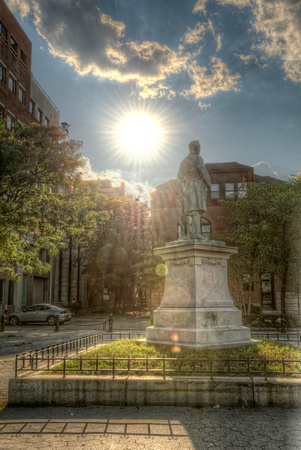 Sunflare over Sam Sloan Statue in Hoboken HDR