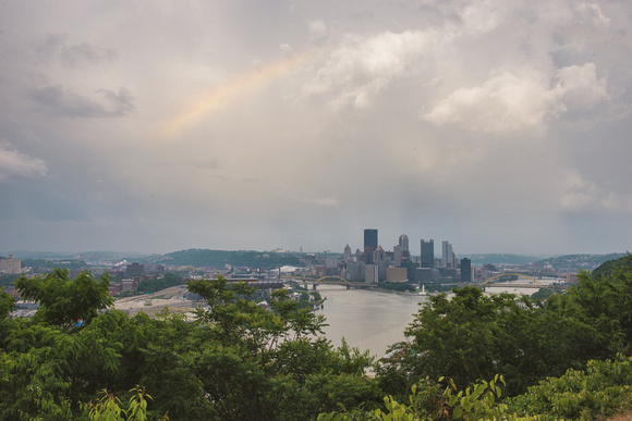 Part of a rainbow over the Pittsburgh skyline