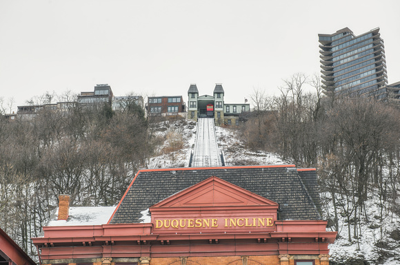 Car at the top of the snow covered Duquesne Incline Station in Pittsburgh