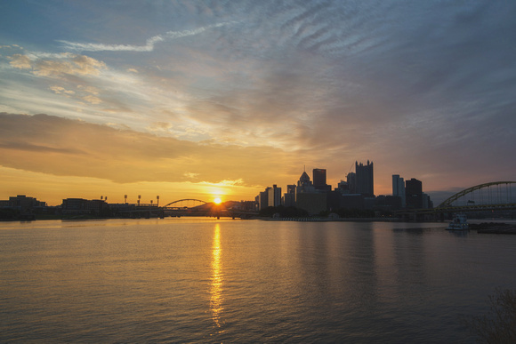 Sun reflecting in the Ohio River at dawn in Pittsburgh