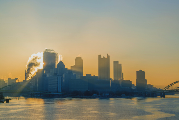 A golden sky over Pittsburgh from the West End Bridge