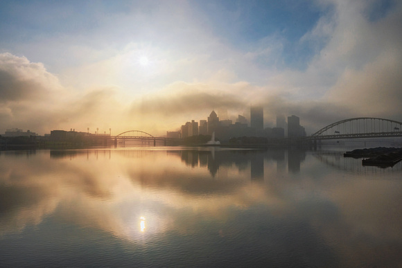 Pittsburgh reflects on a foggy morning