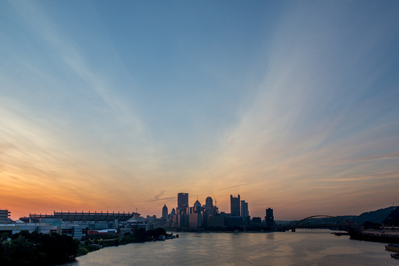 Streaky clouds over the Pittsburgh skyline from the West End Bridge
