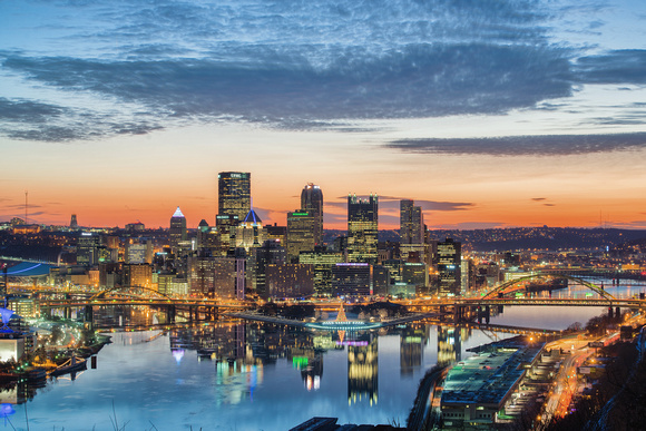 A colorful morning dawns in Pittsburgh as seen from the West End Overlook