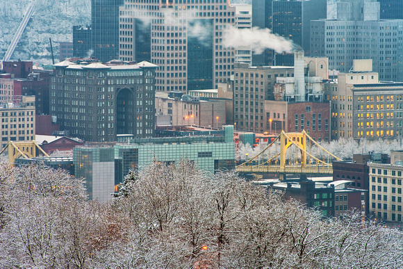 The Roberto Clemente Bridge and Renaissance Hotel in a snowy Pittsburgh