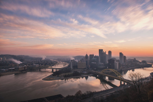 Clouds streak over the city of Pittsburgh on a winter morning