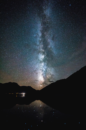 The Milky Way reflects in Crystal Lake along the Red Mountain Pass in Colorado