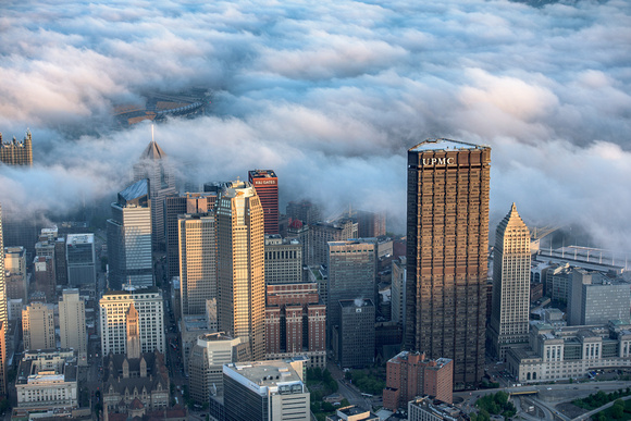 A foggy aerial sunrise in Pittsburgh