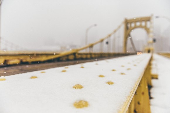 Close up view of a snowy Andy Warhol Bridge in Pittsburgh