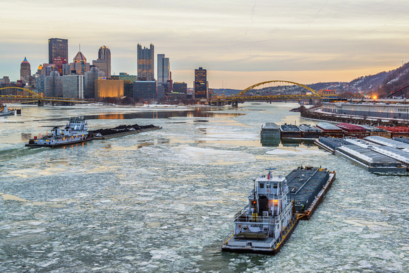 Barges on the ice covered Ohio River in Pittsburgh