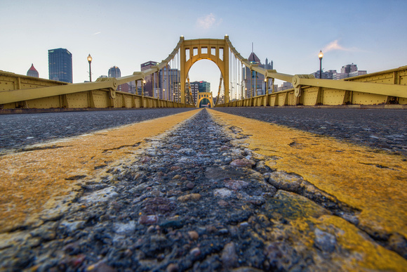 Low down view of the Roberto Clemente Bridge and the Pittsburgh skyline in focus HDR