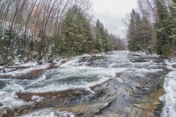 A view up the stream at Ohiopyle State Park in the snow