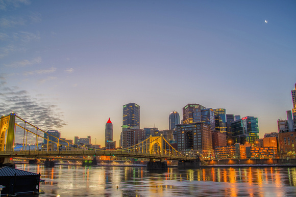 Pittsburgh is lit up in the early morning hours of a winter day