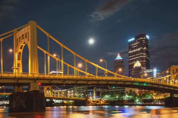 The Supermoon sits nestled in the Pittsburgh skyline