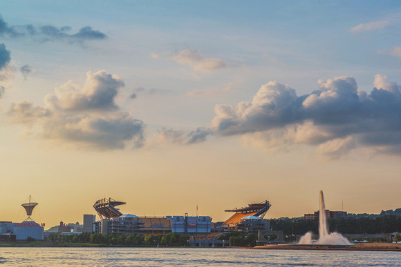 The fountain at Point State Park and Heinz Field at dusk