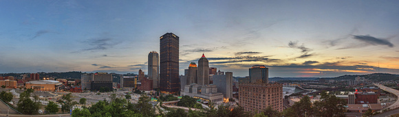 Panorama of the Pittsburgh skyline at dusk from above the city