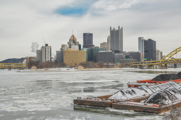 A snow covered barge on the South Shore of Pittsburgh