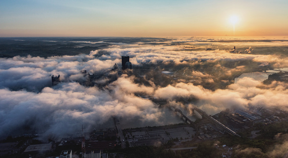 Pittsburgh swims in a seas of fog at dawn