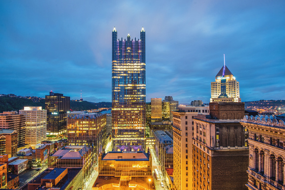 PPG Place lit up before sunrise in Pittsburgh
