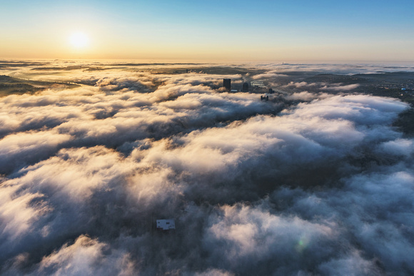 Pittsburgh transforms into a dreamscape in this aerial foggy view