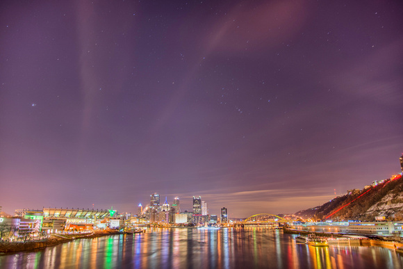 A starry night over the Pittsburgh skyline in winter