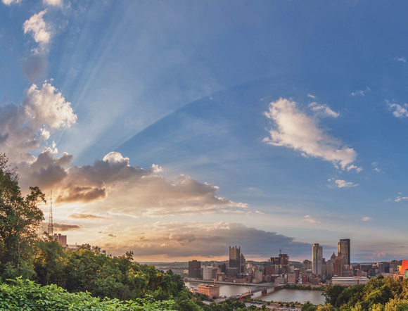 Panorama of the sun rays through the clouds over Pittsburgh