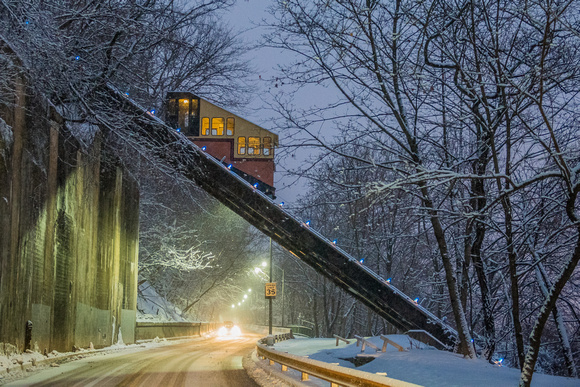 The Mon Incline climbs Mt. Washington on a snowy morning in Pittsburgh