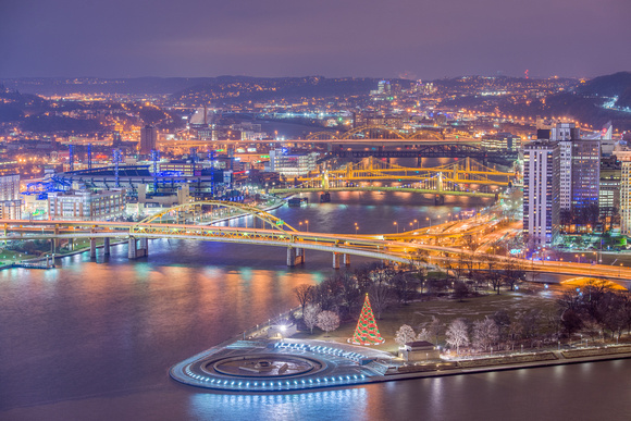 Bridges line the Allegheny River in Pittsburgh around Christmas