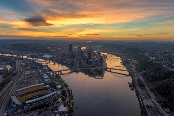 Beautiful colors reflect in the rivers of Pittsburgh at dawn