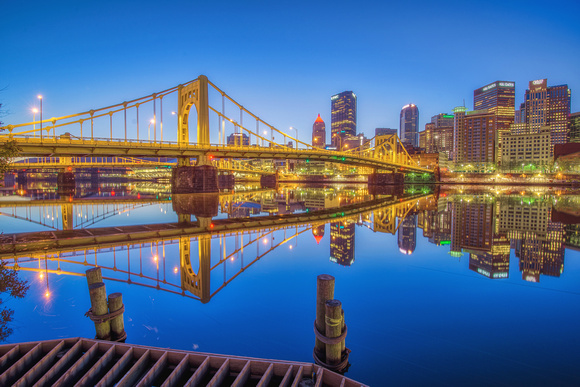 The Andy Warhol Bridge reflects in the Allegheny River in Pittsburgh HDR