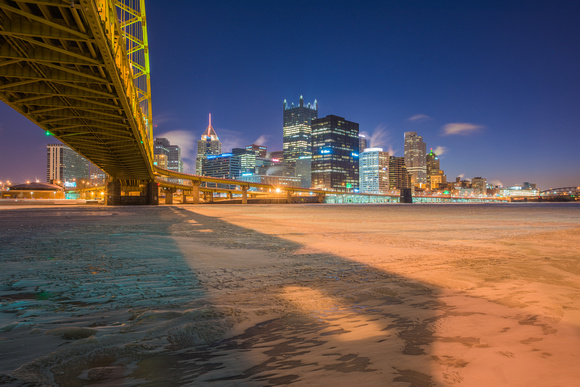 The ice covered Mon under the Ft. Pitt Bridge in Pittsburgh