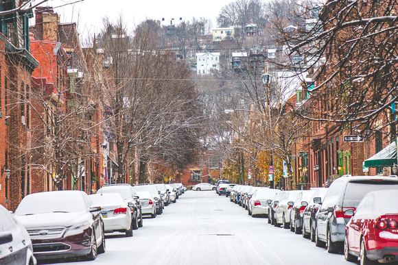 Palo Alto street on the North Side of Pittsburgh is covered in snow during a winter morning