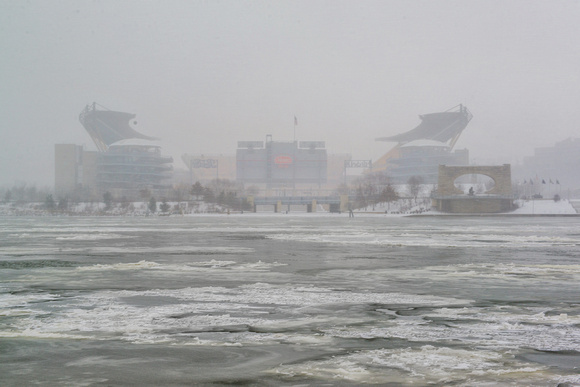 Heinz Field in the snow from across the river at the Point