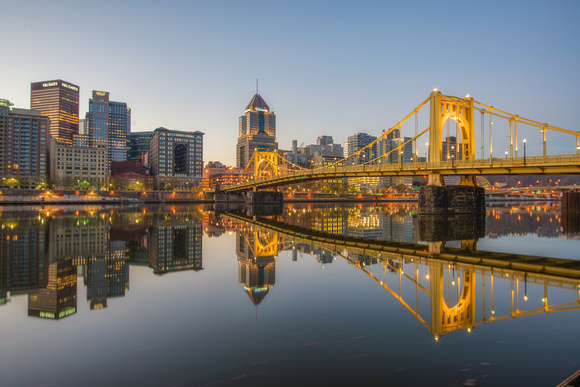 Before first light in Pittsburgh as the Roberto Clemente Bridge reflects in the Allegheny River HDR