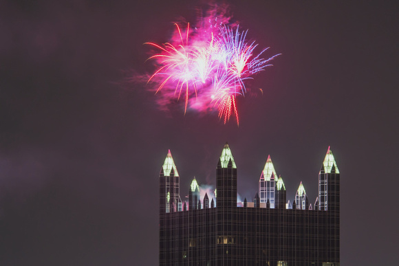 Fireworks going off above PPG Place in Pittsburgh