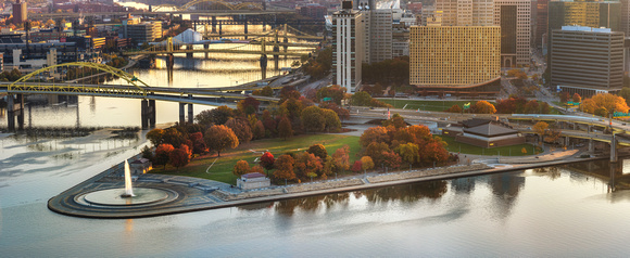 A panorama of Point State Park in Pittsburgh in the fall