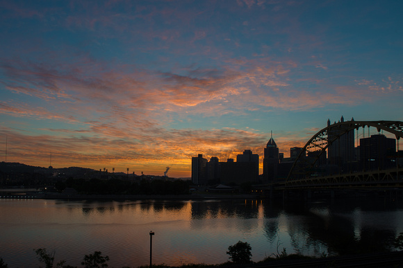 Colorful sky over a silhouetted Pittsburgh