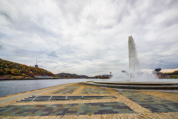 Clouds move over the Point in Pittsburgh near the fountain in the fall
