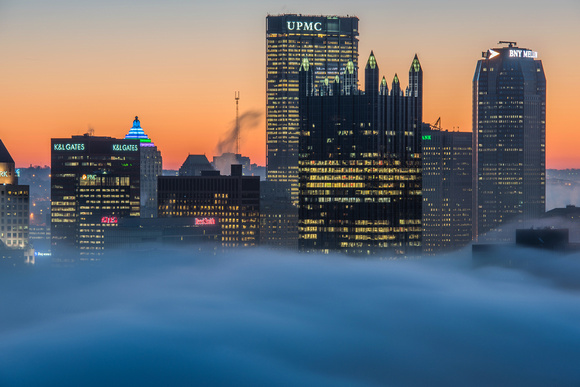 Downtown Pittsburgh through the fog before sunrise