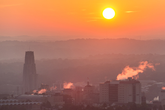 Sunrise over the Cathedral of Learning from the roof of the Steel Building