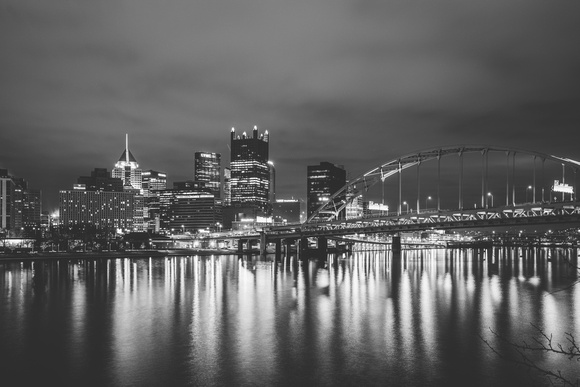 A black and white view of Pittsburgh at night