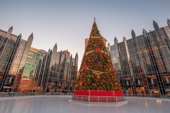 An empty ice rink around the Christmas tree at PPG Place in Pittsburgh