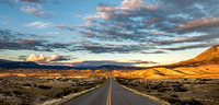 A long stretch of open road at dusk in Colorado