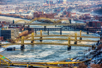 Bridges cross the icy Allegheny River in Pittsburgh