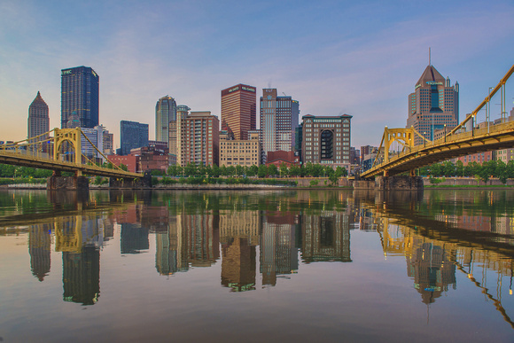 Reflections of the Pittsburgh skyline at dawn on the North Shore