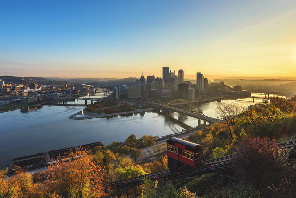 The Duquesne Incline and Pittsburgh skyline during a beautiful fall sunrise