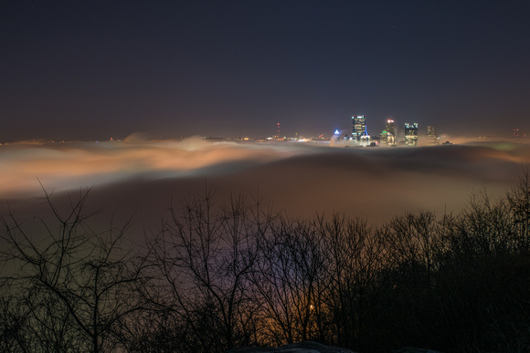Pittsburgh shines in the fog from the West End Overlook