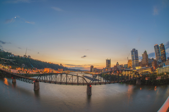 Fisheye view of Pittsburgh at sunset from the Liberty Bridge