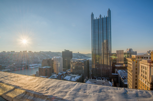 The sun shines over PPG Place and downtown Pittsburgh