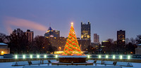 The Christmas tree at the Point glows on a snowy morning